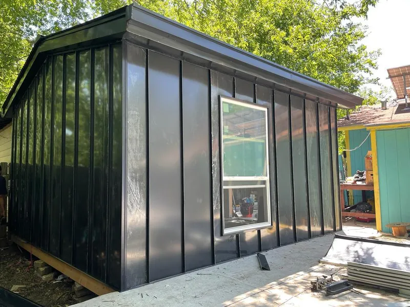 Black standing seam metal wall panels for Roof Inspection in Sun Prairie