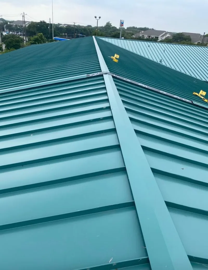 Green commercial metal roof ridge and valley for Metal Roof Repair in Sun Prairie